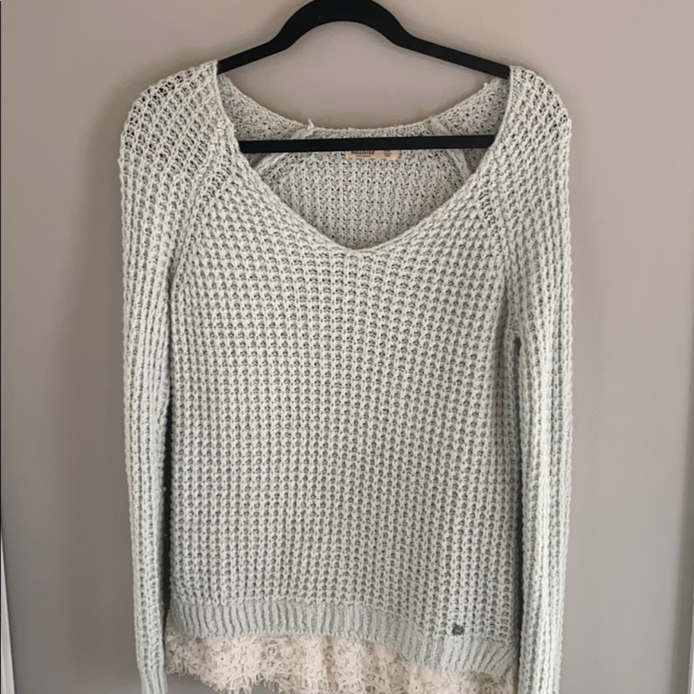 light blue sweater